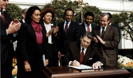 Ronald Reagan and Coretta Scott King at the Martin Luther King Jr. Day signing ceremony
