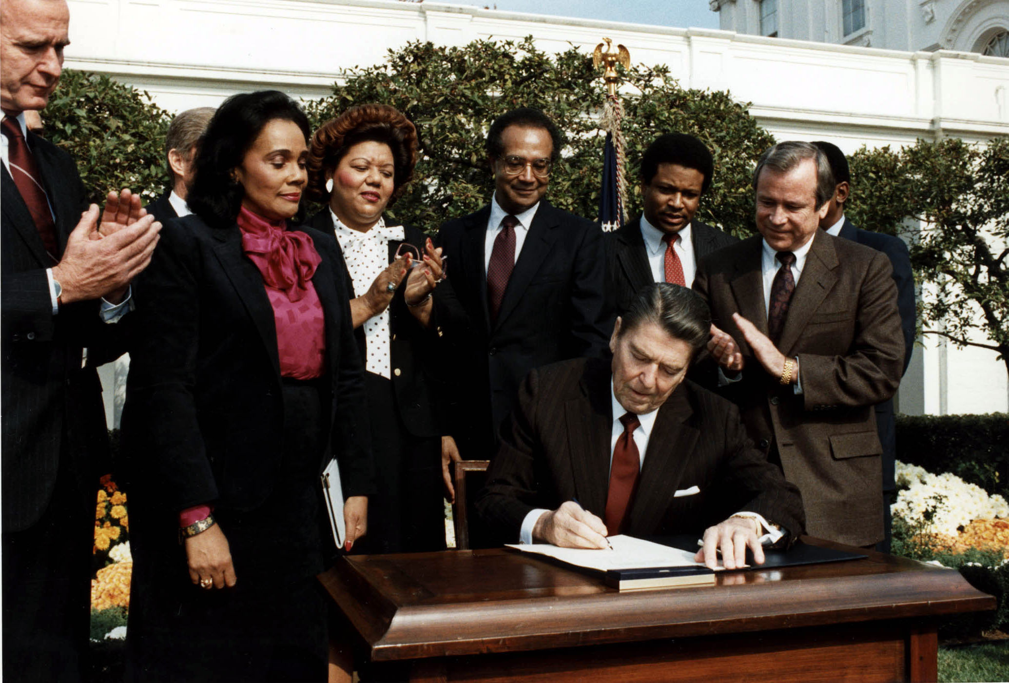 Ronald Reagan and Coretta Scott King at the Martin Luther King Jr. Day signing ceremony