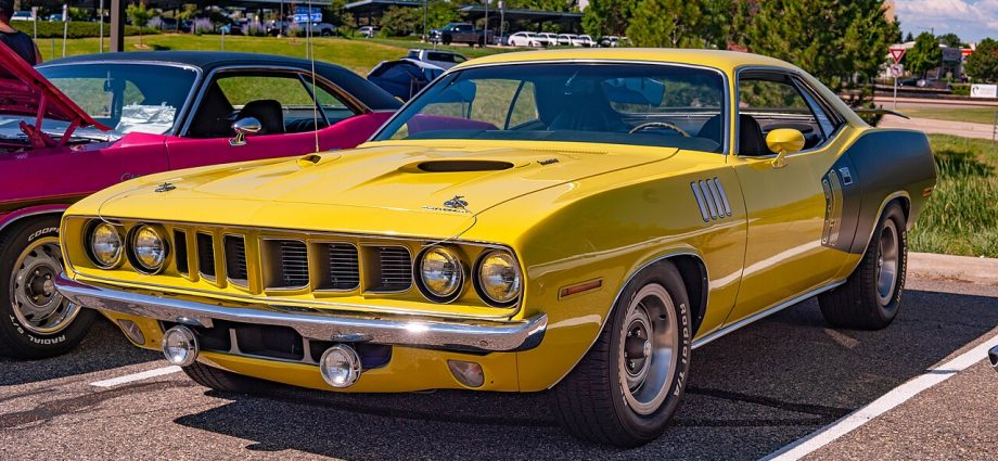 1971 Plymouth HEMI Cuda – The Rare Beast of the Dream Cruise FunInMichigan. The Dream Cruise classic car celebration is more than just a car parade – it’s a celebration of Detroit’s rich automotive heritage. Every August, thousands of vintage auto show Detroit enthusiasts gather along Woodward Avenue to witness live music and car shows, enjoy Woodward Dream Cruise events, and immerse themselves in Woodward Cruise 2025 schedule. From legendary muscle cars like the Mustang and Camaro to rare classics, the event offers something for every gearhead. Plan your visit, find the best vintage auto show Detroit, and be part of the world’s largest one-day automotive festival.