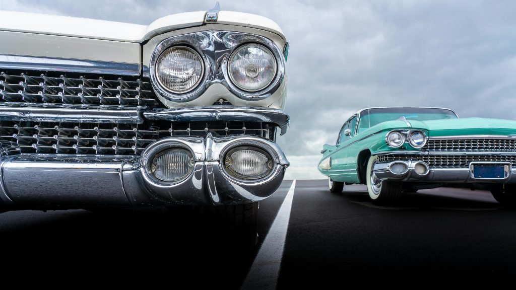 Can you explain the difference between a classic car and a restomod at the cruise