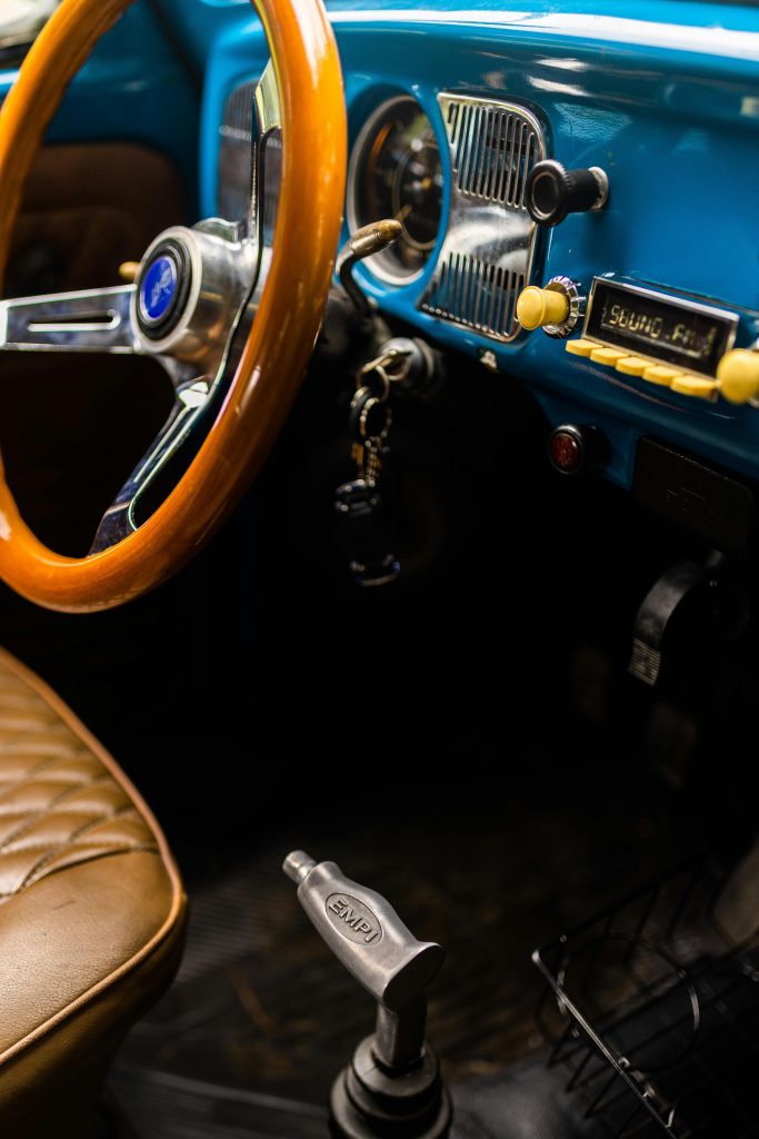 What are the charity and philanthropic efforts associated with the Woodward Dream Cruise